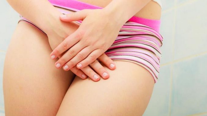 Woman-holds-hands-genital-area_91d63ed8db4e577e23ee14ec37c61773